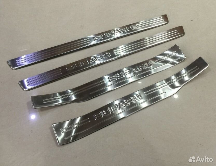 Накладки на внешние пороги (нерж.) на Subaru Outba