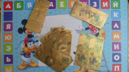 Сувенирные золотые банкноты 100 рублей