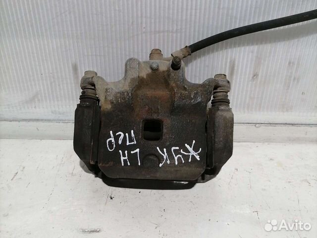 Суппорт передний левый Nissan Juke