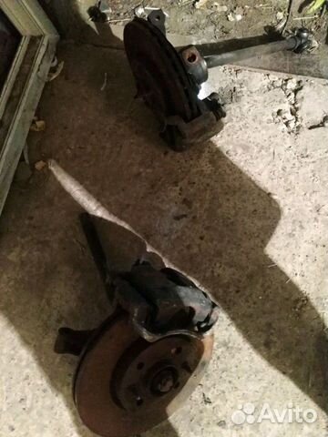 Кулак поворотный с супортом от Fiat albea