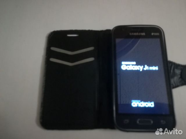 89120012564  Смартфон SAMSUNG J1 с чехлом 