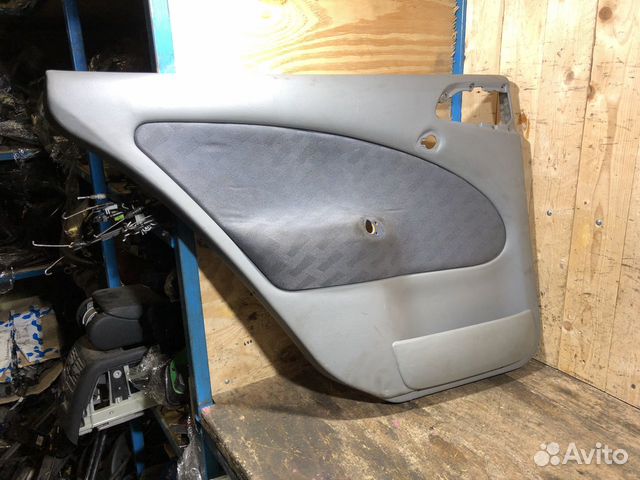 Обшивка задней левой двери Skoda Octavia Tour
