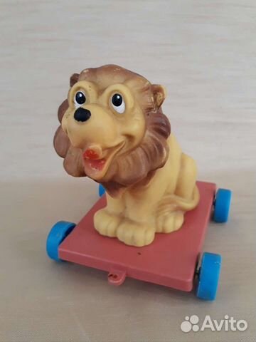 Игрушка Резиновый лев на тележке