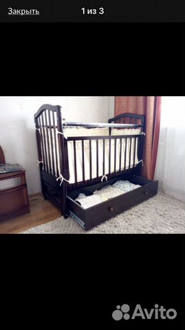 Детская кроватка с продольным маятником