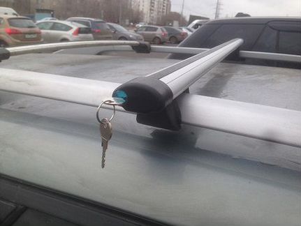 Багажник на рейлинги с замками