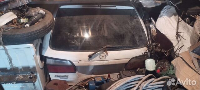 Задняя дверь Mazda cappella