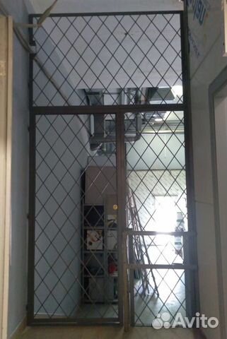 Дверь металлическая решётчатая