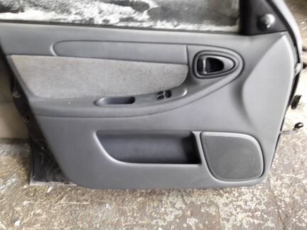 Обшивка двери Шевроле Ланос