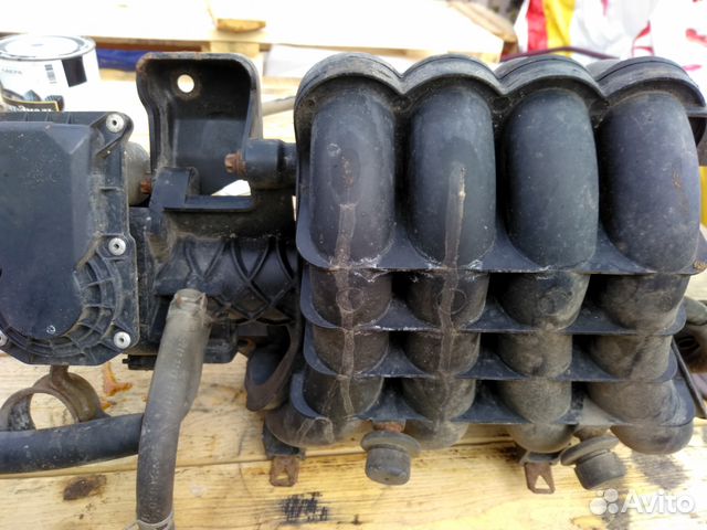 Впускной коллектор Митсубиси Лансер 10 1.5 4А91