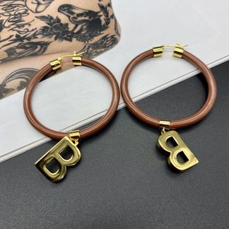 Серьги Balenciaga коричневые