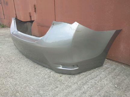 Бампер Toyota Corolla 180 задний оригинал