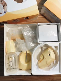 Молокоотсос Medela (электрический)