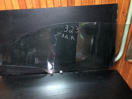 Стекло дверей правой Mazda 323С купе 1994-1998