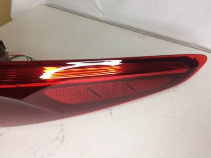 Фонарь левый наружный Киа Рио 4