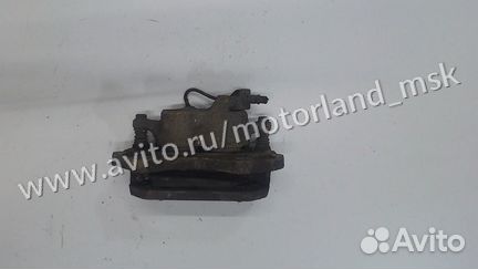 Суппорт левый передний Mitsubishi L200, 2002